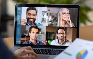 photo faces on screen in a virtual meeting